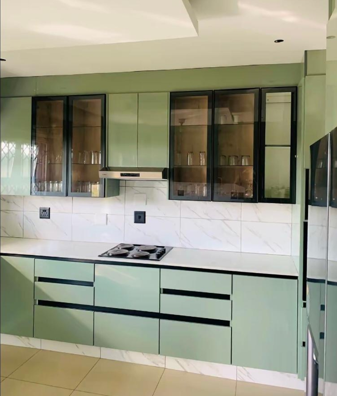 Vertical oak timber slat wall cladding feature wall with felt backing in Pretoria East, Gauteng by Elite Wood Works